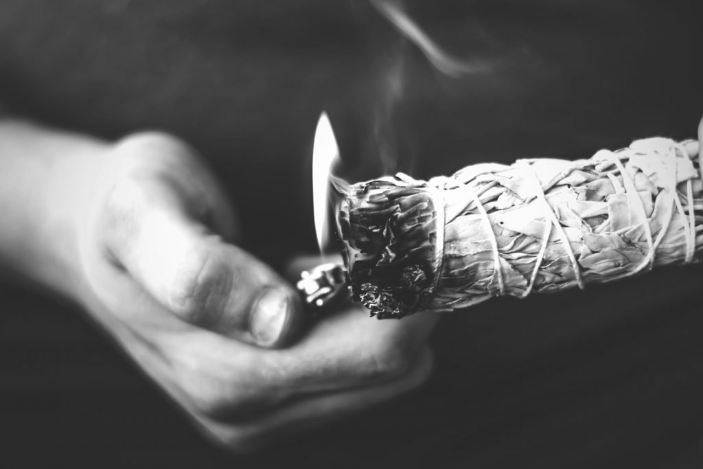 grayscale photo of lighted Sage